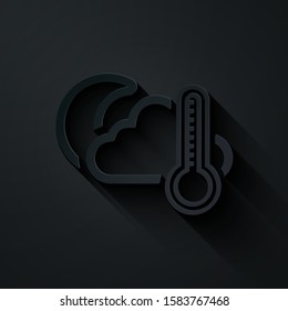 Paper cut Thermometer and cloud with moon icon isolated on black background. Paper art style. Vector Illustration