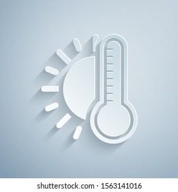Paper cut Thermometer with sun icon isolated on grey background. Paper art style. Vector Illustration