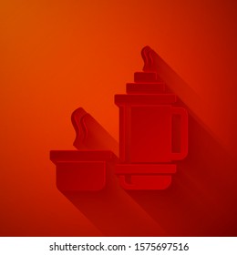 Paper cut Thermos container icon isolated on red background. Thermo flask icon. Camping and hiking equipment. Paper art style. Vector Illustration