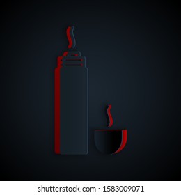 Paper cut Thermos container icon isolated on black background. Thermo flask icon. Camping and hiking equipment. Paper art style. Vector Illustration