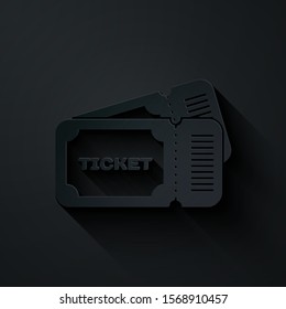 Paper cut Ticket icon isolated on black background. Paper art style. Vector Illustration
