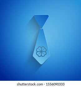 Paper cut Tie with four leaf clover icon isolated on blue background. Necktie and neckcloth symbol. Happy Saint Patricks day. Paper art style. Vector Illustration