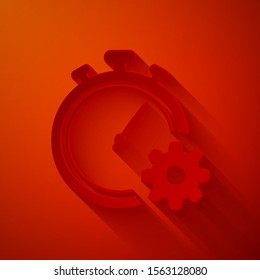 Paper cut Time Management icon isolated on red background. Clock and gear sign. Productivity symbol. Paper art style. Vector Illustration