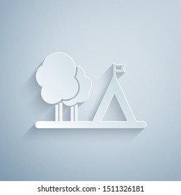 Paper cut Tourist tent with flag icon isolated on grey background. Camping symbol. Paper art style. Vector Illustration