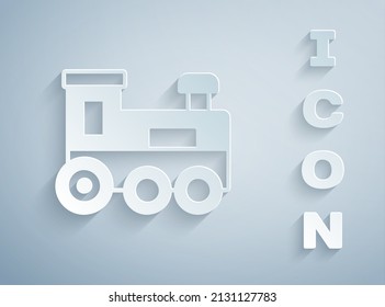 Paper cut Toy train icon isolated on grey background. Paper art style. Vector