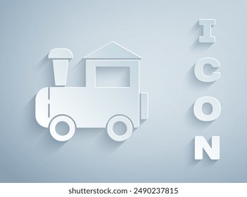 Paper cut Toy train icon isolated on grey background. Paper art style. Vector