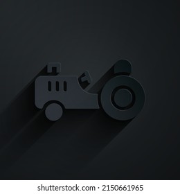 Paper cut Tractor icon isolated on black background. Paper art style. Vector