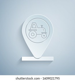 Paper cut Tractor and location icon isolated on grey background. Paper art style. Vector Illustration