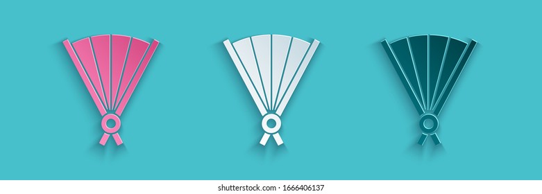 Paper cut Traditional paper chinese or japanese folding fan icon isolated on blue background. Paper art style. Vector Illustration