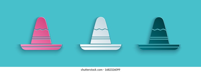 Paper cut Traditional mexican sombrero hat icon isolated on blue background. Paper art style. Vector Illustration