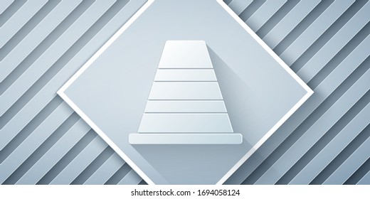 Paper cut Traffic cone icon isolated on grey background. Paper art style. Vector Illustration