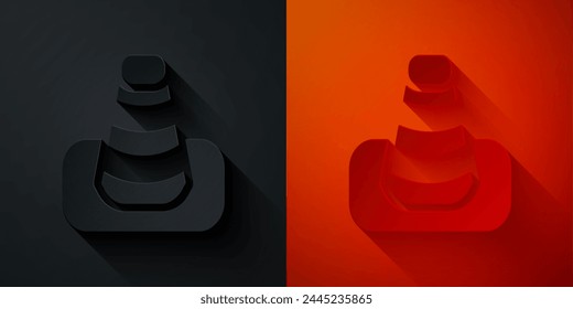 Paper cut Traffic cone icon isolated on black and red background. Paper art style. Vector
