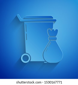 Paper cut Trash can icon isolated on blue background. Garbage bin sign. Recycle basket icon. Office trash icon. Paper art style. Vector Illustration