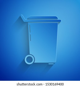 Paper cut Trash can icon isolated on blue background. Garbage bin sign. Recycle basket icon. Office trash icon. Paper art style. Vector Illustration
