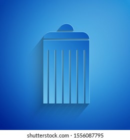 Paper cut Trash can icon isolated on blue background. Garbage bin sign. Recycle basket icon. Office trash icon. Paper art style. Vector Illustration