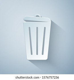 Paper cut Trash can icon isolated on grey background. Garbage bin sign. Recycle basket icon. Office trash icon. Paper art style. Vector Illustration