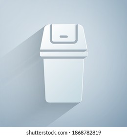 Paper cut Trash can icon isolated on grey background. Garbage bin sign. Recycle basket icon. Office trash icon. Paper art style. Vector