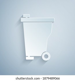 Paper cut Trash can icon isolated on grey background. Garbage bin sign. Recycle basket icon. Office trash icon. Paper art style. Vector.