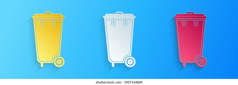Paper cut Trash can icon isolated on blue background. Garbage bin sign. Recycle basket icon. Office trash icon. Paper art style. Vector.