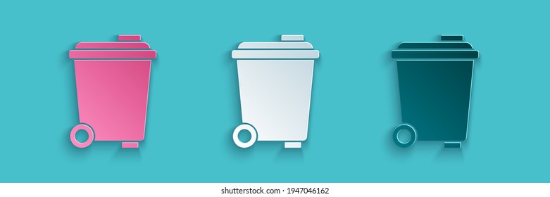 Paper cut Trash can icon isolated on blue background. Garbage bin sign. Recycle basket icon. Office trash icon. Paper art style. Vector