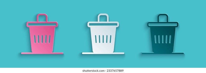 Paper cut Trash can icon isolated on blue background. Garbage bin sign. Recycle basket icon. Office trash icon. Paper art style. Vector