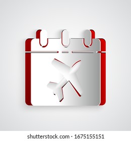 Paper cut Travel planning calendar and airplane icon isolated on grey background. A planned holiday trip. Paper art style. Vector Illustration