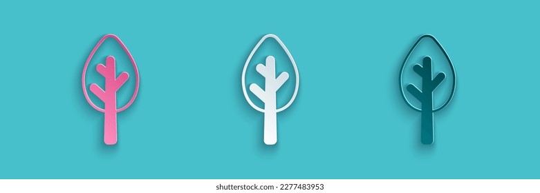 Paper cut Tree icon isolated on blue background. Forest symbol. Paper art style. Vector