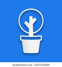 Paper cut Tree icon isolated on blue background. Forest symbol. Paper art style. Vector