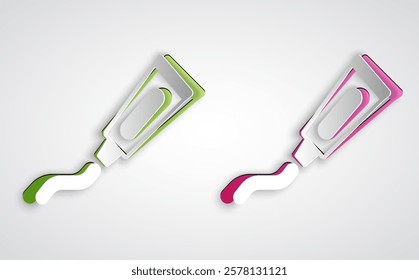 Paper cut Tube of toothpaste icon isolated on grey background. Paper art style. Vector