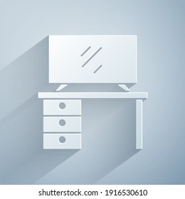 Paper cut TV table stand icon isolated on grey background. Paper art style. Vector