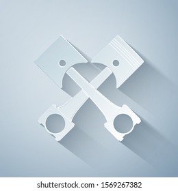 Paper cut Two crossed engine pistons icon isolated on grey background. Paper art style. Vector Illustration