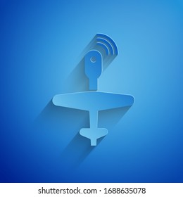 Paper cut UAV Drone icon isolated on blue background. Military Unmanned aircraft spy. Paper art style. Vector Illustration