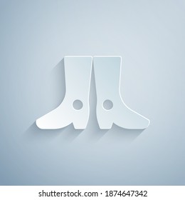 Paper cut Ukrainian national footwear icon isolated on grey background. Traditional ethnic boots. Paper art style. Vector.