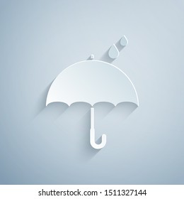 Paper cut Umbrella and rain drops icon isolated on grey background. Waterproof icon. Protection, safety, security concept. Water resistant symbol. Paper art style. Vector Illustration