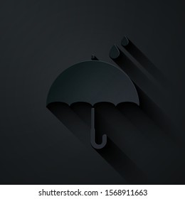 Paper cut Umbrella and rain drops icon isolated on black background. Waterproof icon. Protection, safety, security concept. Water resistant symbol. Paper art style. Vector Illustration