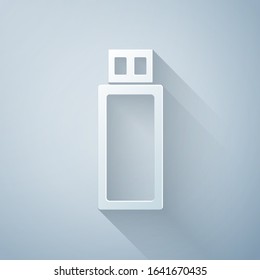 Paper cut USB flash drive icon isolated on grey background. Paper art style. Vector Illustration