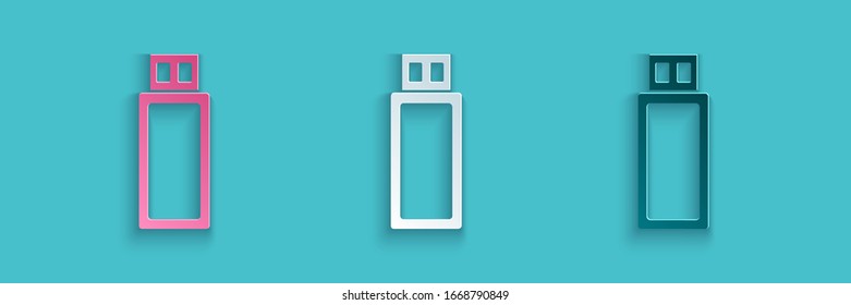 Paper cut USB flash drive icon isolated on blue background. Paper art style. Vector Illustration