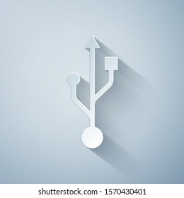 Paper cut USB symbol icon isolated on grey background. Usb flash drive symbol. Paper art style. Vector Illustration