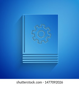 Paper cut User manual icon isolated on blue background. User guide book. Instruction sign. Read before use. Paper art style. Vector Illustration