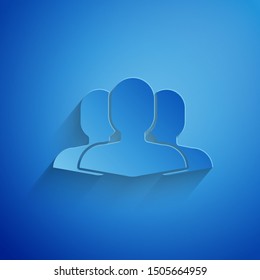 Paper cut Users group icon isolated on blue background. Group of people icon. Business avatar symbol users profile icon. Paper art style. Vector Illustration