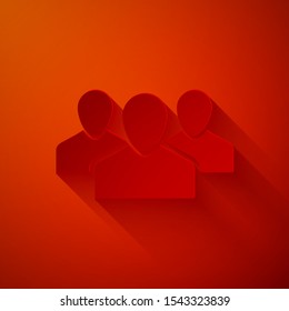 Paper cut Users group icon isolated on red background. Group of people icon. Business avatar symbol - users profile icon. Paper art style. Vector Illustration
