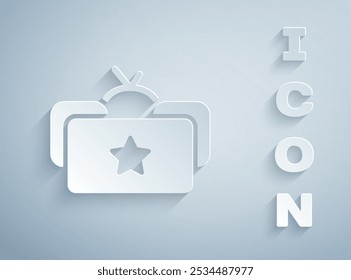 Paper cut Ushanka icon isolated on grey background. Russian fur winter hat ushanka with star. Soviet Union uniform of KGB and NKVD. Paper art style. Vector