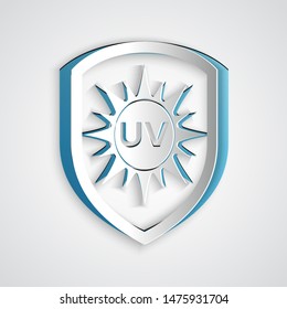 Paper cut UV protection icon isolated on grey background. Sun and shield. Ultra violet rays radiation. SPF sun sign. Paper art style. Vector Illustration