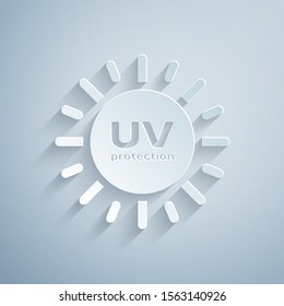 Paper cut UV protection icon isolated on grey background. Ultra violet rays radiation. SPF sun sign. Paper art style. Vector Illustration