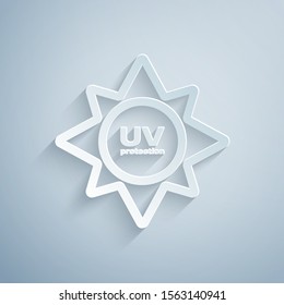 Paper cut UV protection icon isolated on grey background. Ultra violet rays radiation. SPF sun sign. Paper art style. Vector Illustration