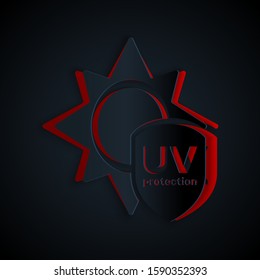 Paper cut UV protection icon isolated on black background. Sun and shield. Ultra violet rays radiation. SPF sun sign. Paper art style. Vector Illustration