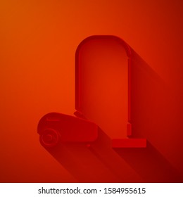 Paper cut Vacuum cleaner icon isolated on red background. Paper art style. Vector Illustration
