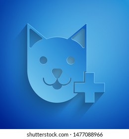 Paper cut Veterinary clinic symbol icon isolated on blue background. Cross with cat veterinary care. Pet First Aid sign. Paper art style. Vector Illustration