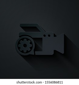 Paper cut Video camera and gear icon isolated on black background. Adjusting app, service concept, setting options, maintenance, repair, fixing. Paper art style. Vector Illustration