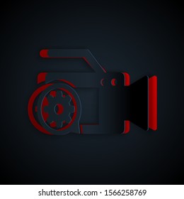 Paper cut Video camera and gear icon isolated on black background. Adjusting app, service concept, setting options, maintenance, repair, fixing. Paper art style. Vector Illustration